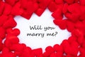 WE WILL MARRY ME? word with red heart shape decoration background. Love, Wedding, Romantic and Happy ValentineÃ¢â¬â¢ s day holiday